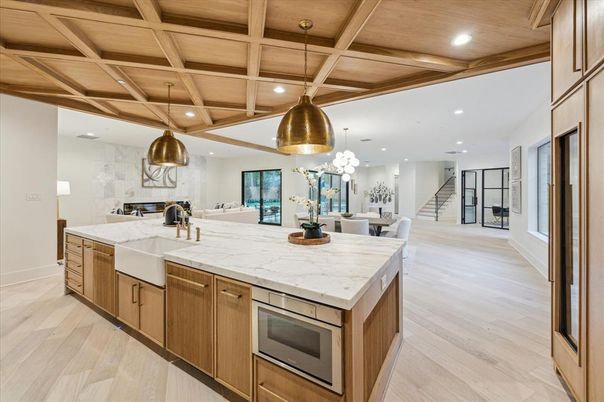 Chandelier, Dining room, Interior, Kitchen, Pendant Lights, Recessed Lighting, Stainless Steel Appliances, Wooden Beams, Wooden Ceilings, Wood Texture Flooring