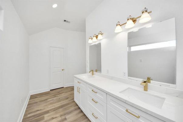 Bathroom, Dual Sink Vanities, Interior, Recessed Lighting, Wood Texture Flooring