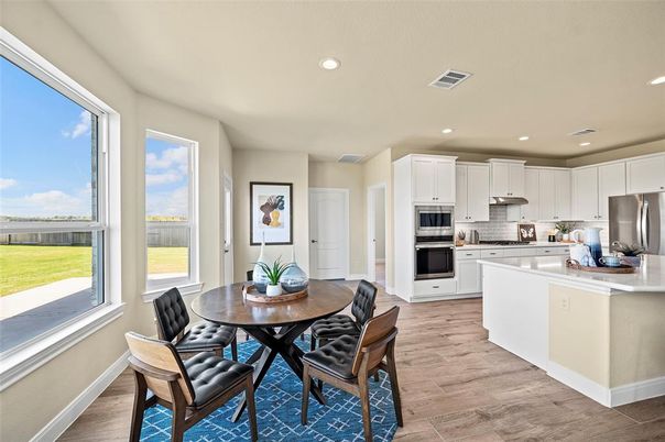 Dining room, Interior, Kitchen, Recessed Lighting, Stainless Steel Appliances, Wood Texture Flooring