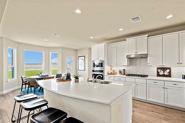 Dining room, Interior, Kitchen, Recessed Lighting, Stainless Steel Appliances, Wood Texture Flooring