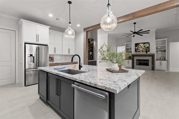 Fireplace, Interior, Kitchen, Pendant Lights, Recessed Lighting, Stainless Steel Appliances, Wood Texture Flooring