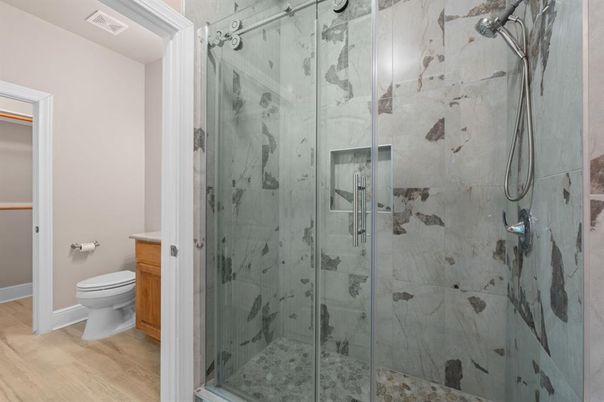 Bathroom, Glass Shower, Interior, Marble Walls, Wood Texture Flooring
