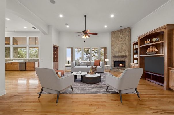Fireplace, Interior, Living room, Recessed Lighting, Stone Walls, Wood Texture Flooring