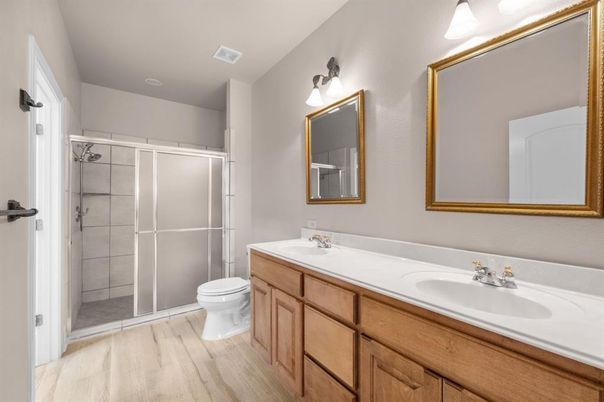 Bathroom, Dual Sink Vanities, Glass Shower, Interior, Wood Texture Flooring