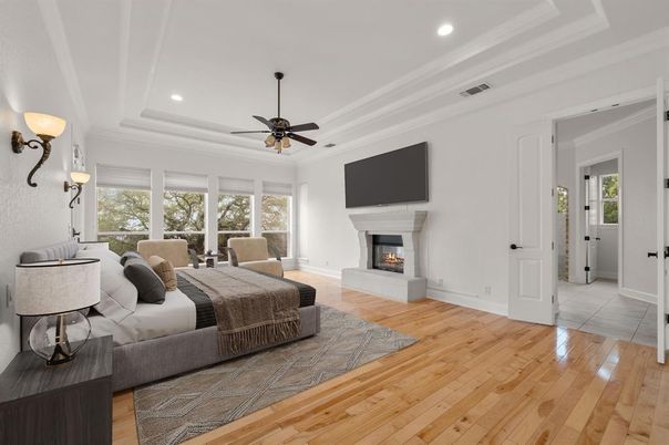Bedroom, Fireplace, Interior, Recessed Lighting, Wood Texture Flooring