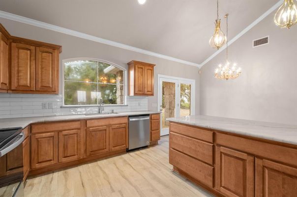Chandelier, Interior, Kitchen, Pendant Lights, Recessed Lighting, Stainless Steel Appliances, Wood Texture Flooring