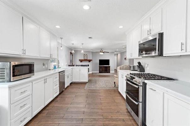 Interior, Kitchen, Pendant Lights, Recessed Lighting, Stainless Steel Appliances, Wood Texture Flooring