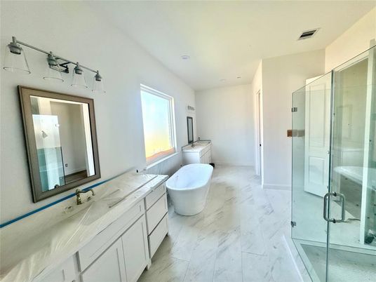 Bathroom, Dual Sink Vanities, Free Standing Baths, Glass Shower, Interior, Marble, Recessed Lighting