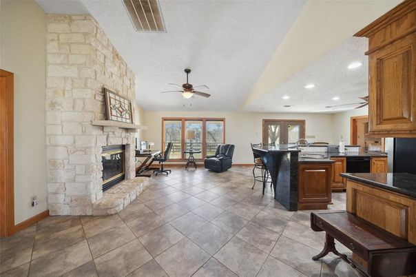 Fireplace, Interior, Kitchen, Recessed Lighting, Stone Walls