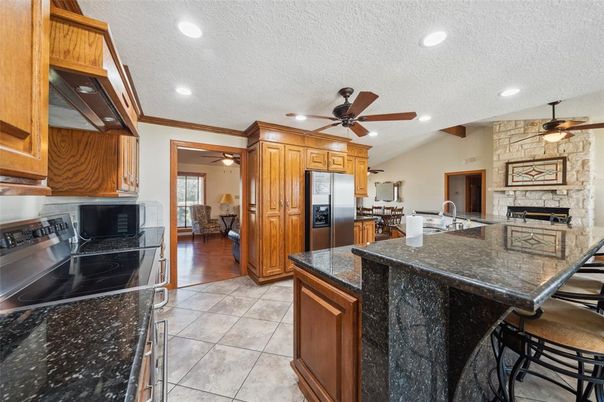 Fireplace, Interior, Kitchen, Recessed Lighting, Stone Walls