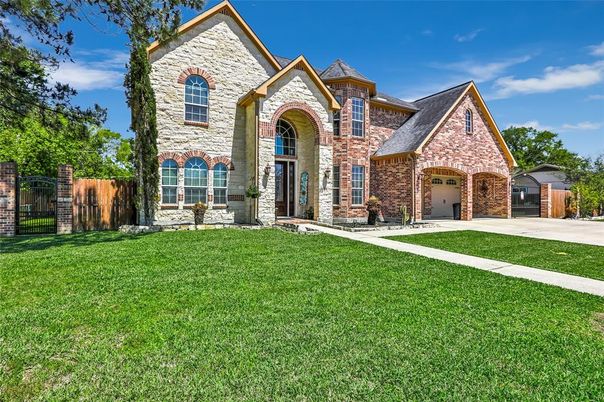 Attached, Backyard, Exterior, Facade, Brick Facade, Brick Traditional