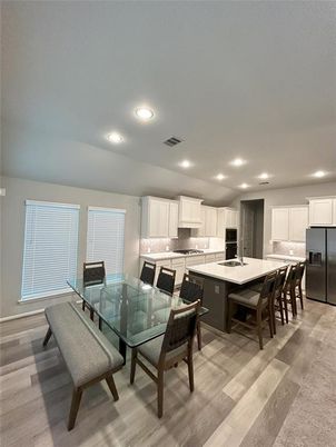 Dining room, Interior, Kitchen, Recessed Lighting, Stainless Steel Appliances, Wood Texture Flooring