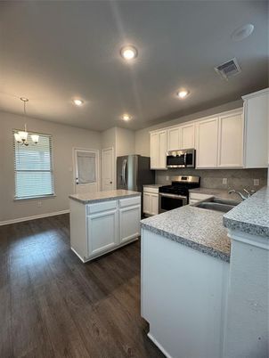 Chandelier, Interior, Kitchen, Recessed Lighting, Stainless Steel Appliances, Wood Texture Flooring