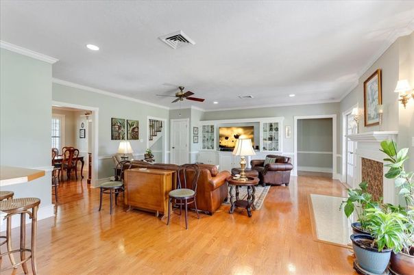 Dining room, Fireplace, Interior, Living room, Recessed Lighting, Wood Texture Flooring
