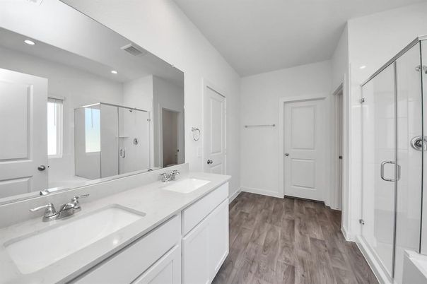 Bathroom, Dual Sink Vanities, Glass Shower, Interior, Recessed Lighting, Wood Texture Flooring