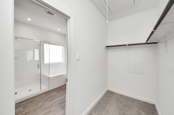 Bathroom, Glass Shower, Interior, Recessed Lighting, Walk-in Closets, Wood Texture Flooring