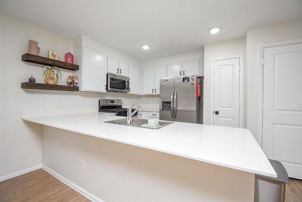 Interior, Kitchen, Recessed Lighting, Stainless Steel Appliances, Wood Texture Flooring