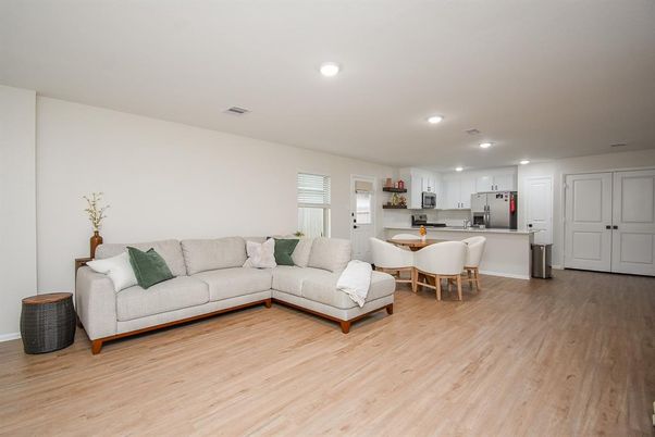 Dining room, Interior, Kitchen, Living room, Recessed Lighting, Stainless Steel Appliances, Wood Texture Flooring