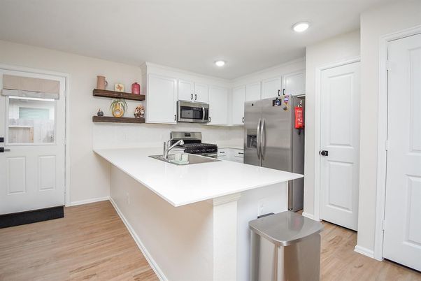 Interior, Kitchen, Recessed Lighting, Stainless Steel Appliances, Wood Texture Flooring