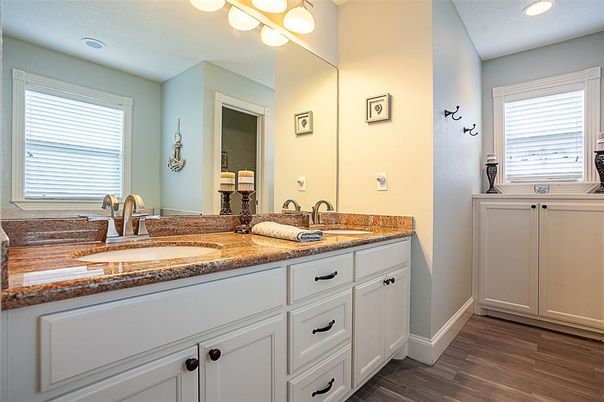 Bathroom, Dual Sink Vanities, Interior, Recessed Lighting, Wood Texture Flooring