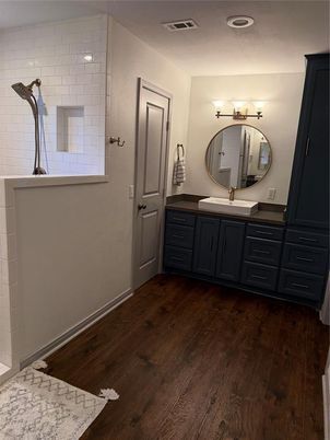 Bathroom, Dual Sink Vanities, Interior, Recessed Lighting, Wood Texture Flooring