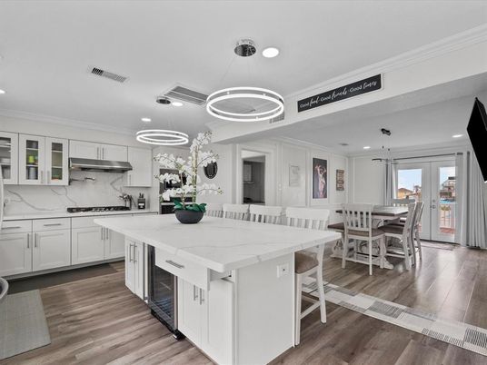 Dining room, Interior, Kitchen, Marble Walls, Pendant Lights, Recessed Lighting, Wood Texture Flooring