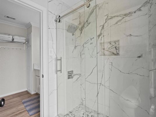 Bathroom, Glass Shower, Interior, Marble Walls, Wood Texture Flooring