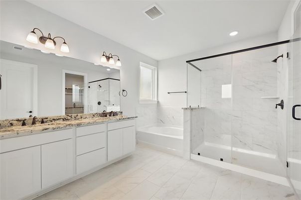 Bathroom, Dual Sink Vanities, Glass Shower, Interior, Marble, Marble Walls, Recessed Lighting