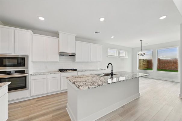 Chandelier, Interior, Kitchen, Pendant Lights, Recessed Lighting, Stainless Steel Appliances, Wood Texture Flooring