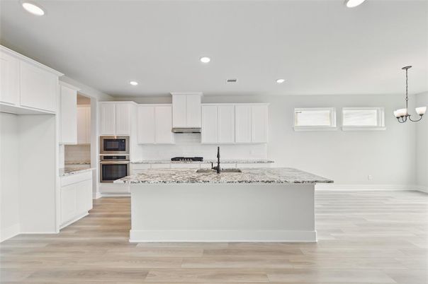 Chandelier, Interior, Kitchen, Pendant Lights, Recessed Lighting, Stainless Steel Appliances, Wood Texture Flooring