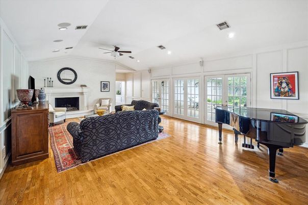 Fireplace, Interior, Living room, Piano, Recessed Lighting, Wood Texture Flooring