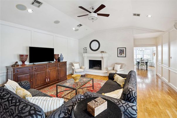Dining room, Fireplace, Interior, Living room, Recessed Lighting, Wood Texture Flooring