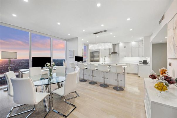 Chandelier, Dining room, Interior, Kitchen, Pendant Lights, Recessed Lighting, Stainless Steel Appliances, Wood Texture Flooring