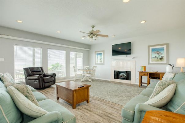 Dining room, Fireplace, Interior, Living room, Recessed Lighting, Wood Texture Flooring