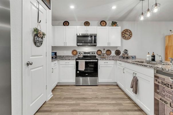 Interior, Kitchen, Pendant Lights, Recessed Lighting, Stainless Steel Appliances, Wood Texture Flooring