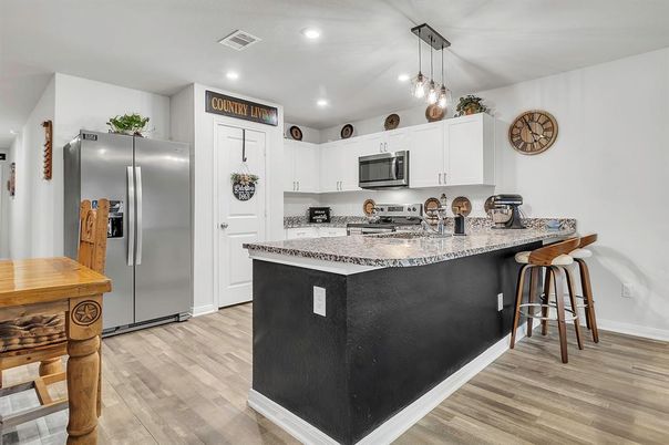 Interior, Kitchen, Pendant Lights, Recessed Lighting, Stainless Steel Appliances, Wood Texture Flooring