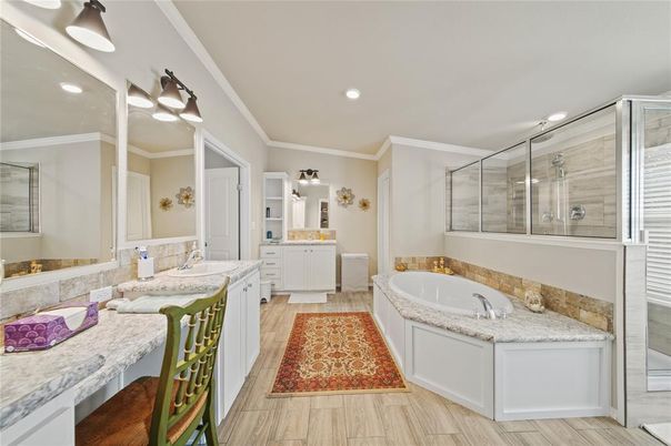Bathroom, Dual Sink Vanities, Glass Shower, Interior, Recessed Lighting, Wood Texture Flooring