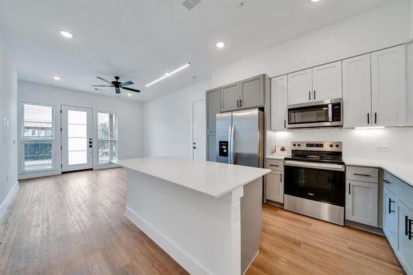 Interior, Kitchen, Recessed Lighting, Stainless Steel Appliances, Wood Texture Flooring