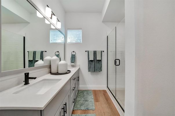 Bathroom, Dual Sink Vanities, Glass Shower, Interior, Wood Texture Flooring