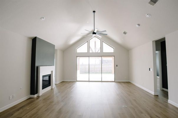 Empty room, Fireplace, Interior, Recessed Lighting, Wood Texture Flooring