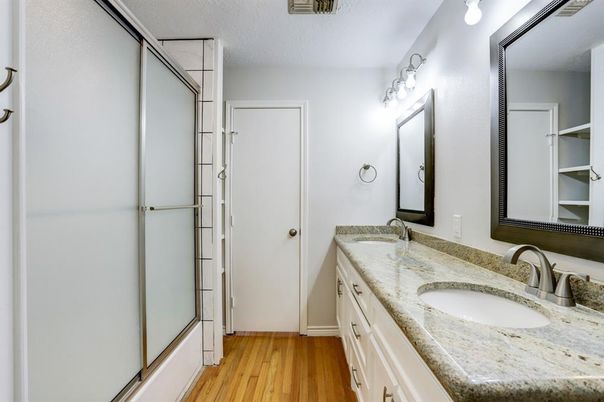 Bathroom, Dual Sink Vanities, Glass Shower, Interior, Wood Texture Flooring