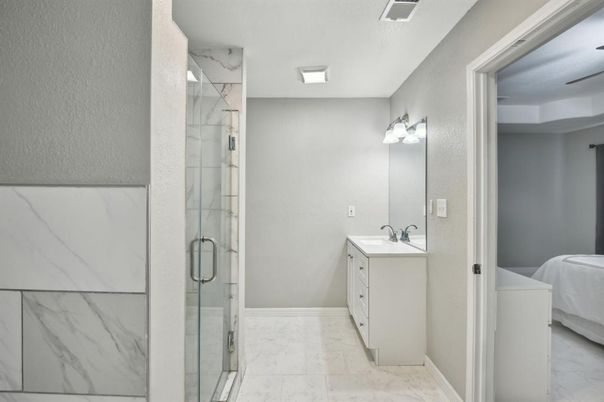 Bathroom, Dual Sink Vanities, Glass Shower, Interior, Marble, Marble Walls