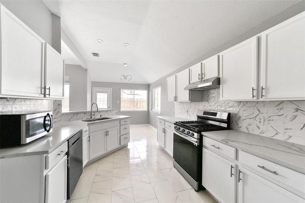 Interior, Kitchen, Marble, Marble Walls, Recessed Lighting, Stainless Steel Appliances