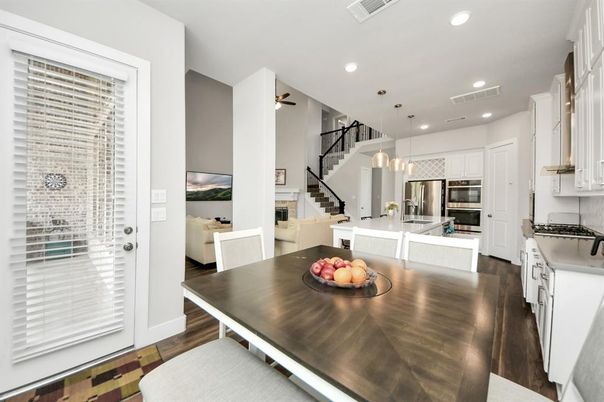 Dining room, Interior, Kitchen, Pendant Lights, Recessed Lighting, Stainless Steel Appliances, Wood Texture Flooring