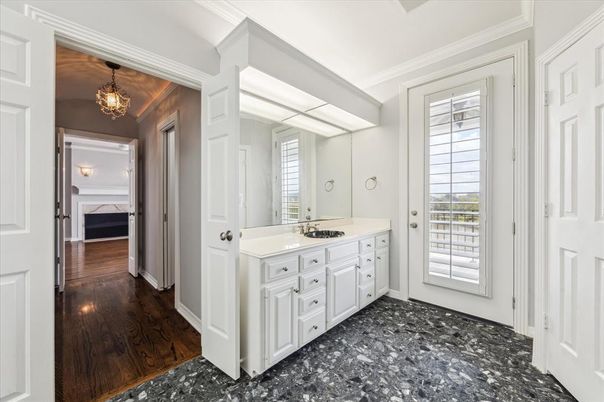 Bathroom, Chandelier, Dual Sink Vanities, Interior, Wood Texture Flooring