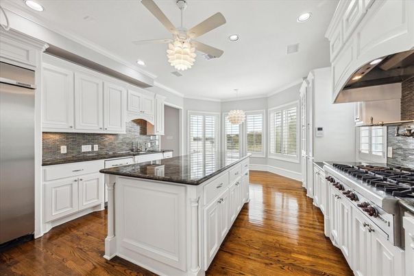 Chandelier, Interior, Kitchen, Recessed Lighting, Stainless Steel Appliances, Wood Texture Flooring