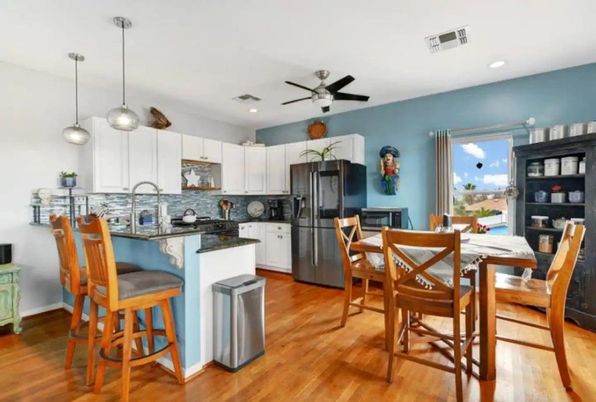 Dining room, Interior, Kitchen, Pendant Lights, Recessed Lighting, Stainless Steel Appliances, Wood Texture Flooring