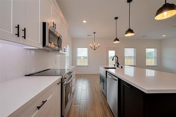 Chandelier, Interior, Kitchen, Pendant Lights, Recessed Lighting, Stainless Steel Appliances, Wood Texture Flooring