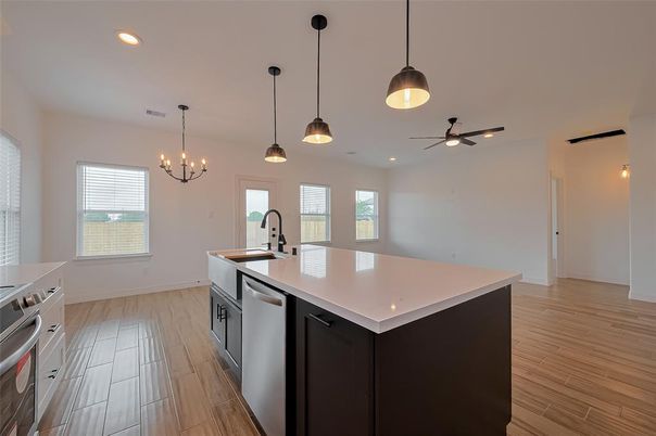 Chandelier, Interior, Kitchen, Pendant Lights, Recessed Lighting, Stainless Steel Appliances, Wood Texture Flooring