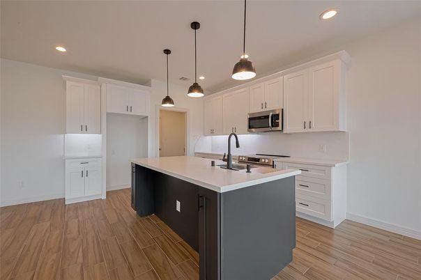 Interior, Kitchen, Pendant Lights, Recessed Lighting, Stainless Steel Appliances, Wood Texture Flooring